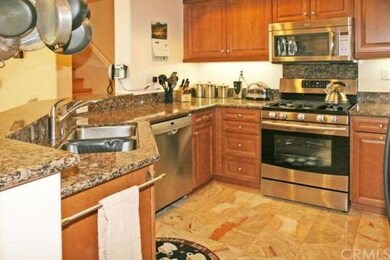 Kitchen Features Custom Cabinets, Granite Counters
