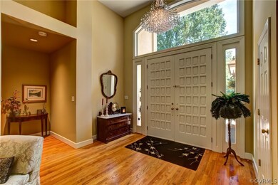 Double door entry with stunning chandelier