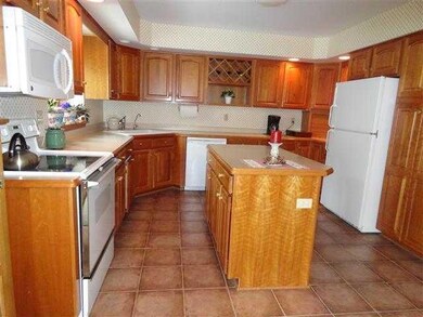 Kitchen Lovely cherry cabinets and center island/b
