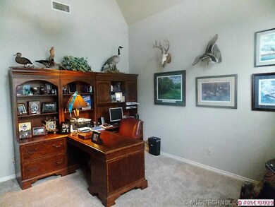 The office is very large with vaulted ceilings.