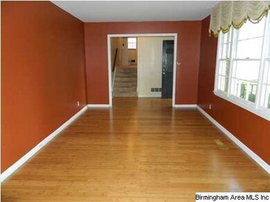 Large formal living are has bamboo laminate floori