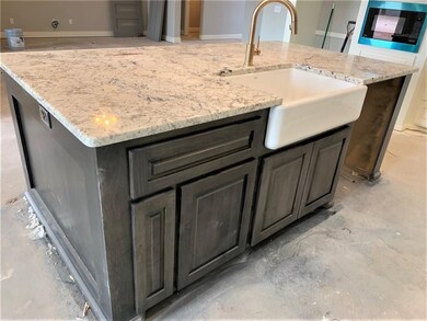 Kitchen island will be surrounded by hand scrapped