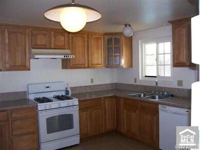 Kitchen with granite counter top and abundant stor