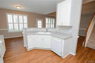 Bright open kitchen has...