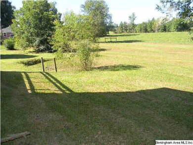 The home backs up to a beautiful green pasture.