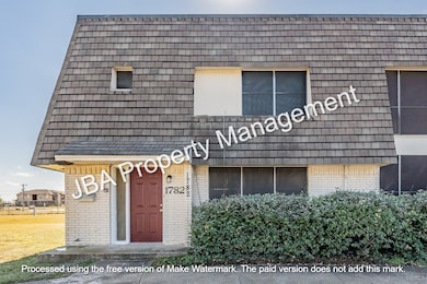 View of front of home featuring brick siding