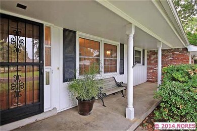 The long covered porch provides a nice space to si