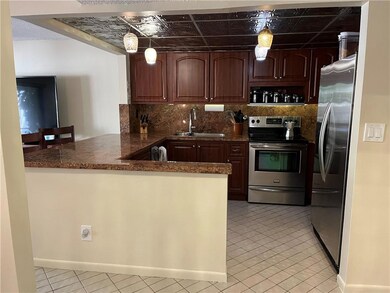 Stainless steel appliances, custom tin ceiling