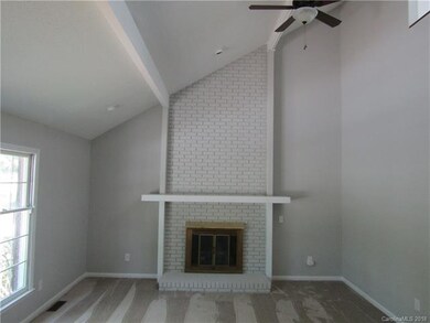 Vaulted ceiling in great room feels expansive and 