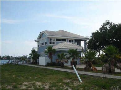 house on the West side of lot