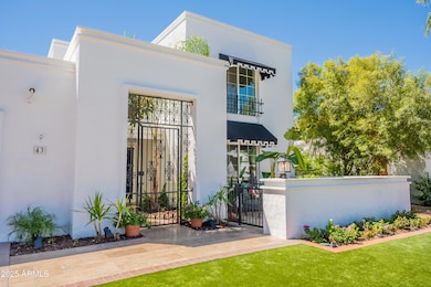 Chic Entry with Iron Detailing