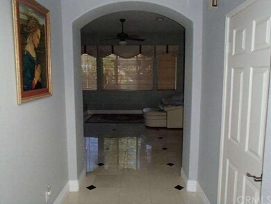 HALL WAY WITH TILE THROUGH OUT THE HOUSE