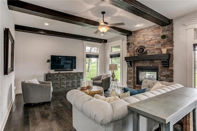 Open wood beam ceiling and wonderful windows.
