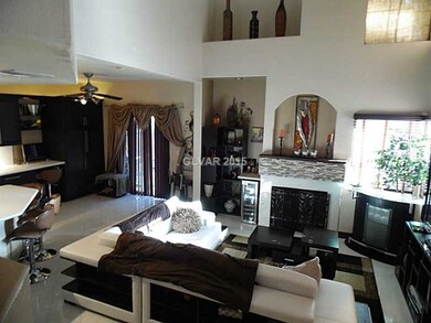Property Photo. Living room has a gas fireplace wi