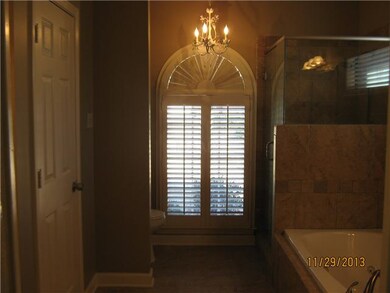 Master bath sports a huge walk in closet, separate