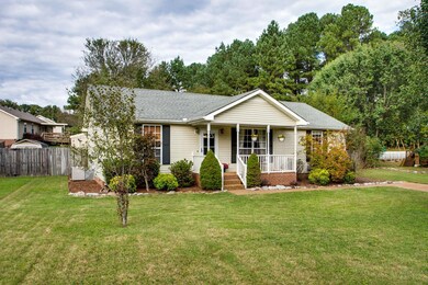 NATURE abounds on this quiet CUL DE SAC!  All on one level, this home offers easy living with a homey feel.