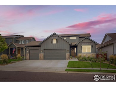 Charming curb appeal with a three-car garage and welcoming front entry at sunset.