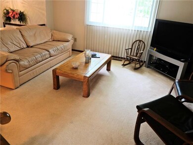 Plenty of Sunlight Fills Your Living Room Area.