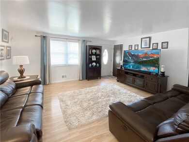 Living room.  Deep coat closet to the right of the