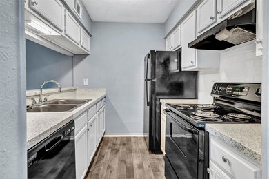 Kitchen with black appliances