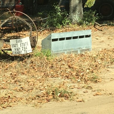 Lot past this address on left side of Hwy