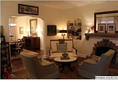 formal living room with gas fireplace
