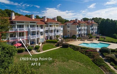 Large Corner Unit with lots of Windows and a large covered Deck with Lake Views!