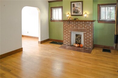 Living room with beautiful hard wood floors and de