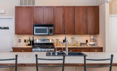 CHERRY CABINETS WITH PLENTY OF STORAGE!