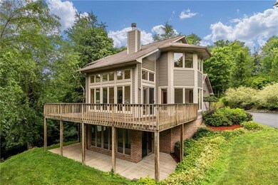 Beautiful deck and 2 sun room on the main and lowe