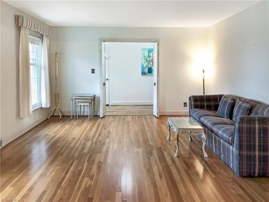 Living room with newly refinished HW floors