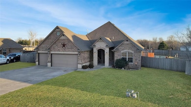 French provincial home with a front yard, concrete