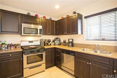 Beautiful Dark Cabinetry, Granite Countertops and 