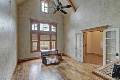 Formal dining or office with vaulted beamed ceilin