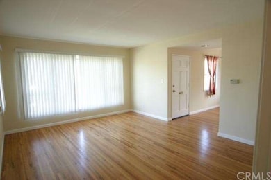Large bright living room with re-finished oak hard