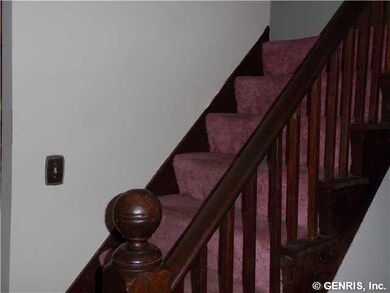 Foyer Entry with 1/2 bath and open stairway