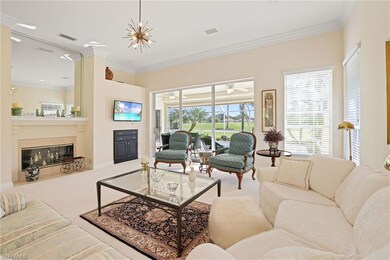 Carpeted living room with ornamental molding and a