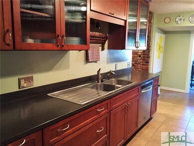 Ikea sink with drain board and several glass front