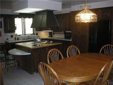 Kitchen. spacious kitchen feturing wood mode cabinets. Ceramic tile floor.