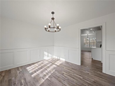 Unfurnished dining area with hardwood / wood-style