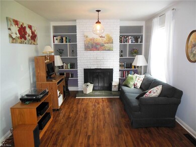 Living Room offers built-ins & Gas Fireplace