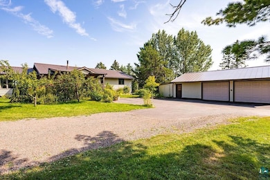 View of front facade with an outdoor structure, a 