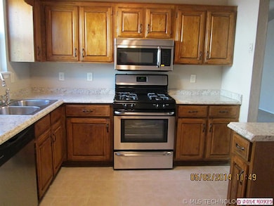 Kitchen features plenty of cabinet space, new SS a