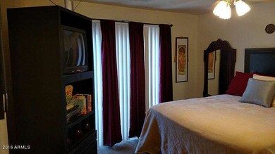 MasterBedroomSlidingGlassDoorToBackyardS
