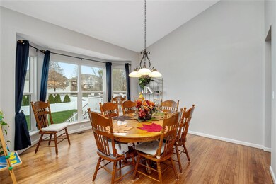 Off of the great room and kitchen, the dining room