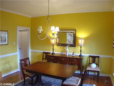 Dining Room - Rich hardwoods, custom trim make thi
