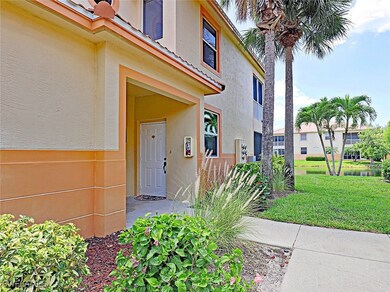 Doorway to property featuring stucco siding and a