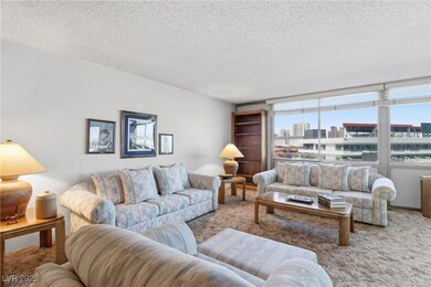 living space area with a city view