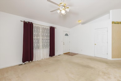 Family room, large picture window and coat closet