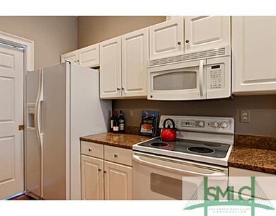 Kitchen. Tons of cabinet space!